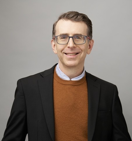 Head shot image of John