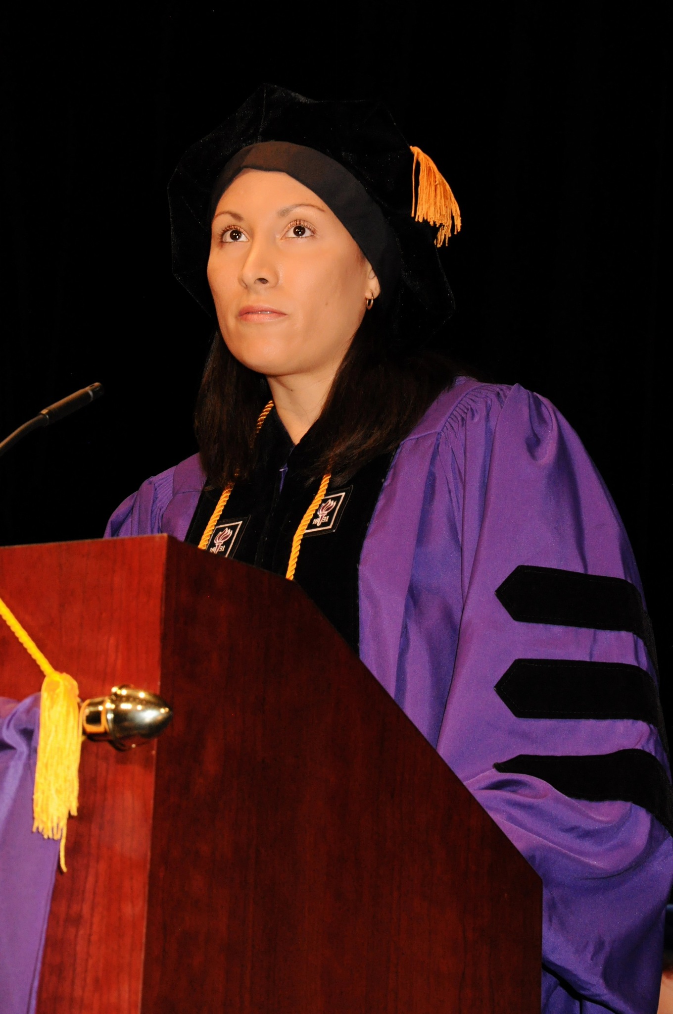 Shani Irby speaking at graduation